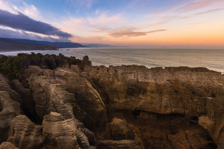 Pancake rock with beatiful sky at Punakaiki, This is famous landmark in New Zealand.の写真素材