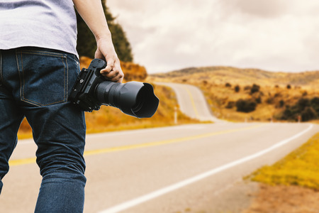 Tourist on the long road for Holiday or journey concept background.の写真素材
