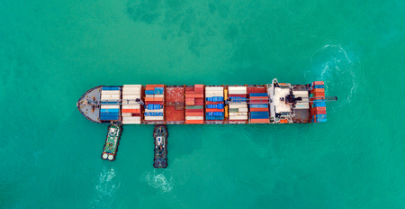 Aerial view cargo ship or shipping container for import export and transportation background.の写真素材