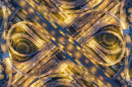 Aerial view highway road intersection for transportation or traffic background.の写真素材