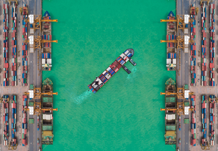 Aerial view container ship from sea port working for delivery containers shipment. Suitable use for...