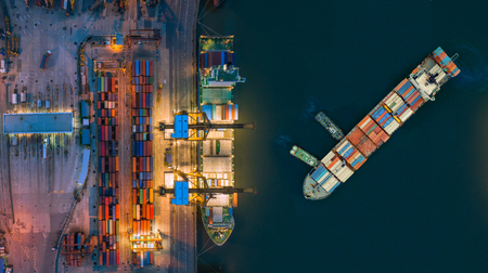 Aerial view container ship from sea port working for delivery containers shipment. Suitable use for...