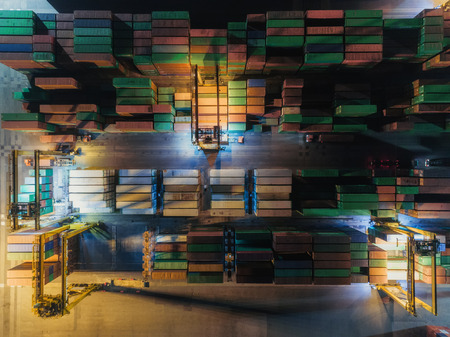 Aerial view container warehouse and crane loading for logistics import  export or transportation...