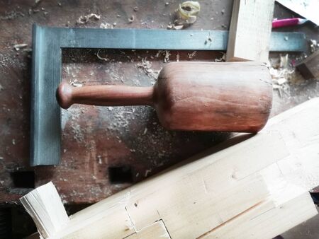 Top of view vintage carpenter tools in a carpentry workshop, hand saw, home wood kit closeupの写真素材