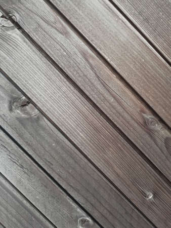 Old vintage planked wood board - rustic background with free text spaceの写真素材