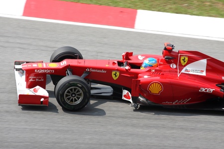 SEPANG, MALAYSIA - MARCH 23: Fernando Alonso of Scuderia Ferrari team in action during PETRONAS Malaysian Grand Prix practice session at Sepang F1 circuit  on 23 March, 2012 in Sepang, Malaysia.のeditorial素材