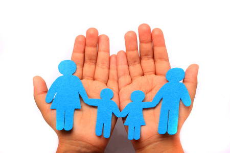 close up of child cupped hands showing cotton family の写真素材