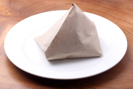 A pack of rice that cooked with coconut milk , in Malay language we calledの写真素材