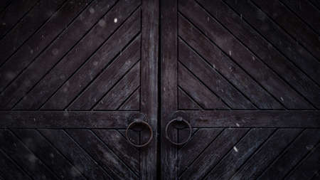 Seventeenth century wooden collars with round metal handles in winter.の写真素材