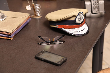 Police Hat on the tableの写真素材