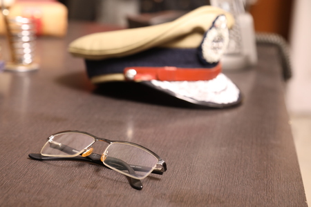 Police Hat on the tableの写真素材