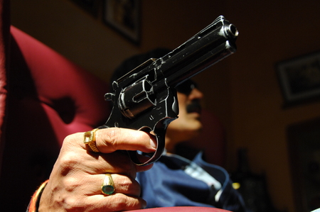 Male Hand with Gunの写真素材