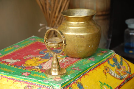 Vintage brass vase on a table in a shop, India