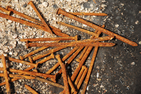 old rusty nails on the ground, close-up, rusty nailsの写真素材