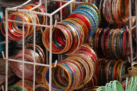 Colorful bracelets for sale at a local market in India.の写真素材