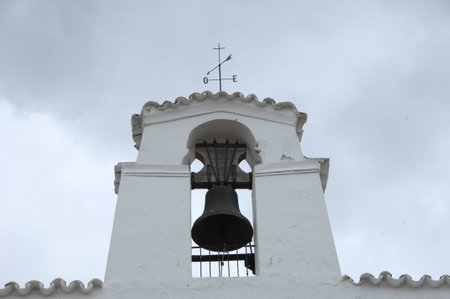 Bell tower of a church in the town of Oia on the Island of Santorini Greeceの写真素材