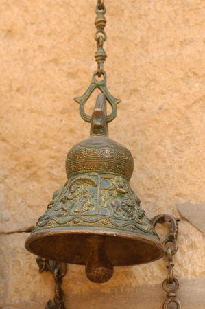 Old bell on the wall of the mosque in Cairo, Egypt.の写真素材