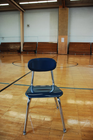 Empty chairs in a gymnasium, close-up view.の写真素材