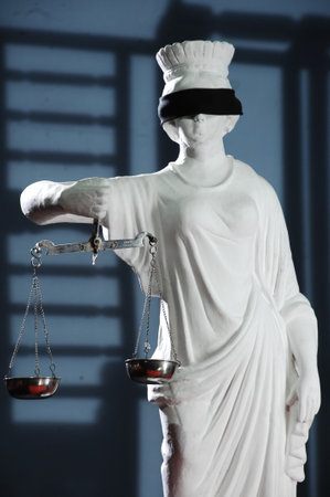 Statue of justice with scales of justice, legal law concept.の写真素材