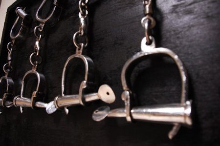 handcuffs on a black background, close-up of photo