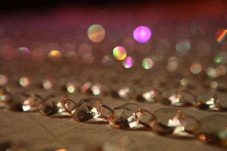 Close up of crystal beads on the table with bokeh backgroundの写真素材