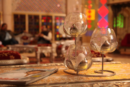 Wine glasses on a table in a restaurant. Selective focus.の写真素材