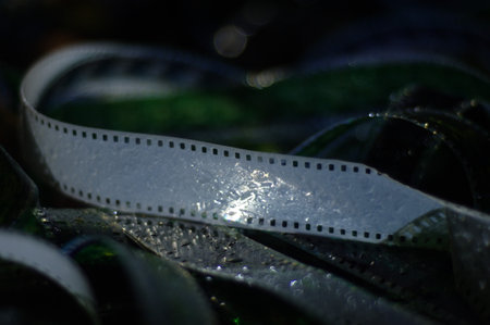 Detail of a film strip with water droplets on it.の写真素材