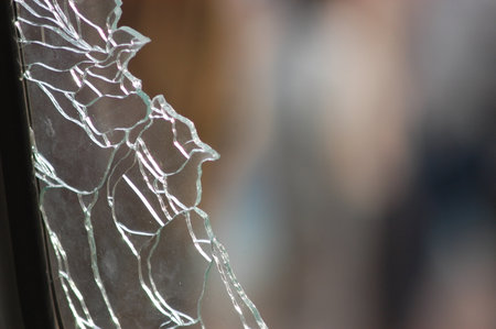 Broken glass on the car. Shallow depth of field.