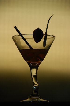Alcohol cocktail drink on the bar table in restaurant. Black backgroundの写真素材