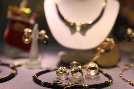 jewelry and bijouterie on display in a shop windowの写真素材