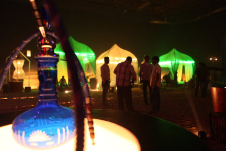 Hookah on the beach at night, closeup of photo