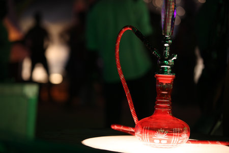 Hookah on the background of the night city. Shisha