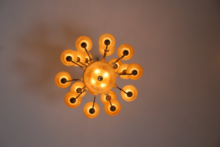 Luxury chandelier in the interior, closeup of photo