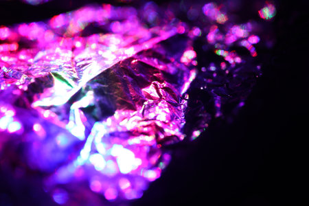 Aluminum foil close-up as a background. Selective focus.の写真素材