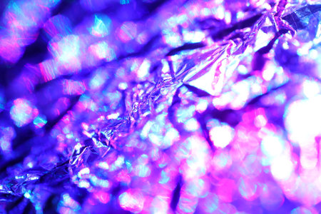abstract background of colored crumpled aluminum foil close-up