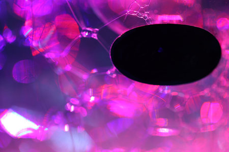 abstract background with bokeh defocused lights and lens flareの写真素材