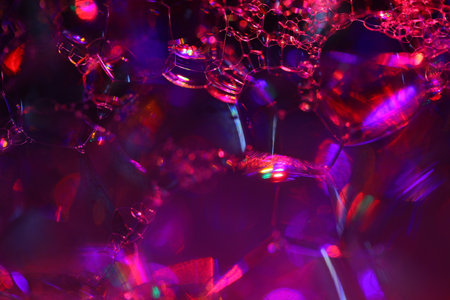 abstract background with bokeh defocused lights and soap bubbles