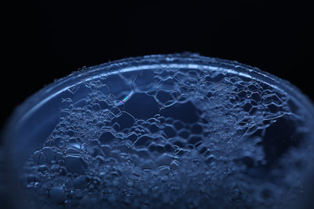 Bubbles of soap on a dark blue background. Macro.の写真素材