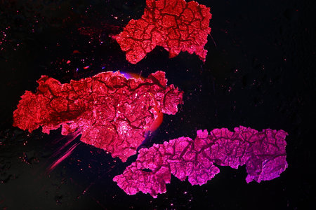 3d rendering of blood cells on a black background with light effects