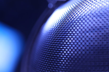 Close-up of a speaker in blue tones. Shallow depth of field.の写真素材