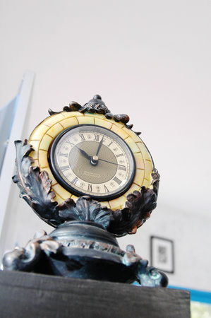 Close up of antique clock on the wall in the room, stock photoの写真素材
