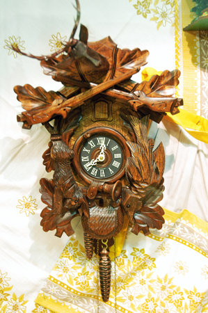 Wooden clock in the shape of a Christmas tree, close-up