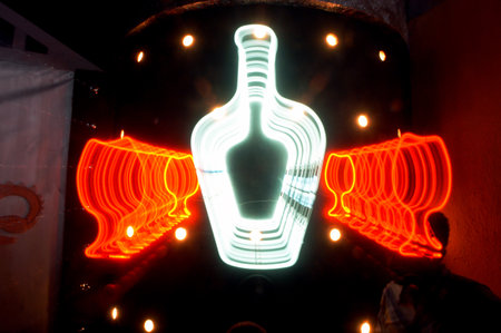 Neon sign in the shape of a guitar in a night clubの写真素材