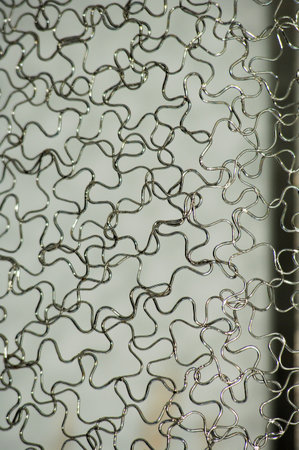 Metal chain link fence on the window. Abstract background for design.の写真素材