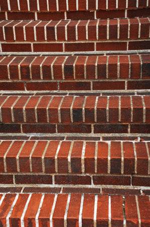 Staircase with red brick, close up. Abstract background.の写真素材