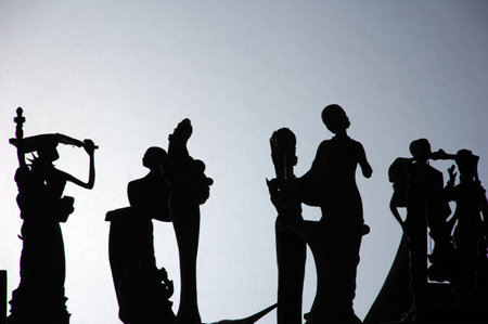 Silhouette of a group of people playing chess on a white backgroundの写真素材
