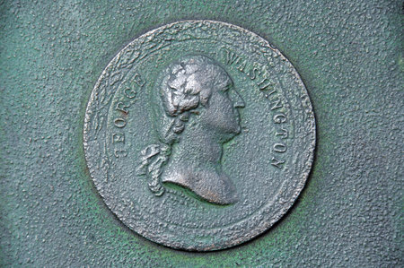 Close-up of the head of a child on a green metal plateの写真素材