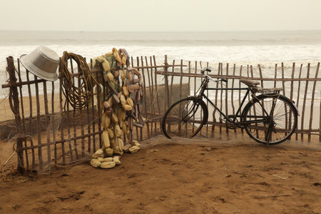 Fishing nets and baskets on the beach in India, Goa