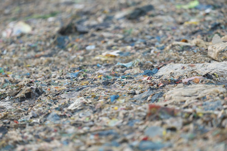 Pile of garbage on the ground. Close up. Selective focus.の写真素材