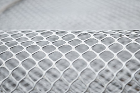 Close up of metal mesh. Abstract background and texture for design.